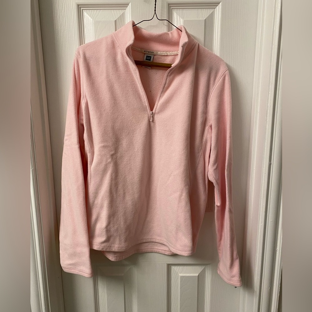 Thin, 3/4 zip fleece.